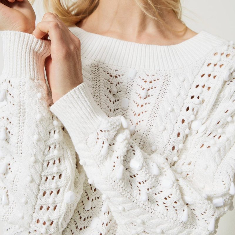 Openwork jumper with handmade embroidery